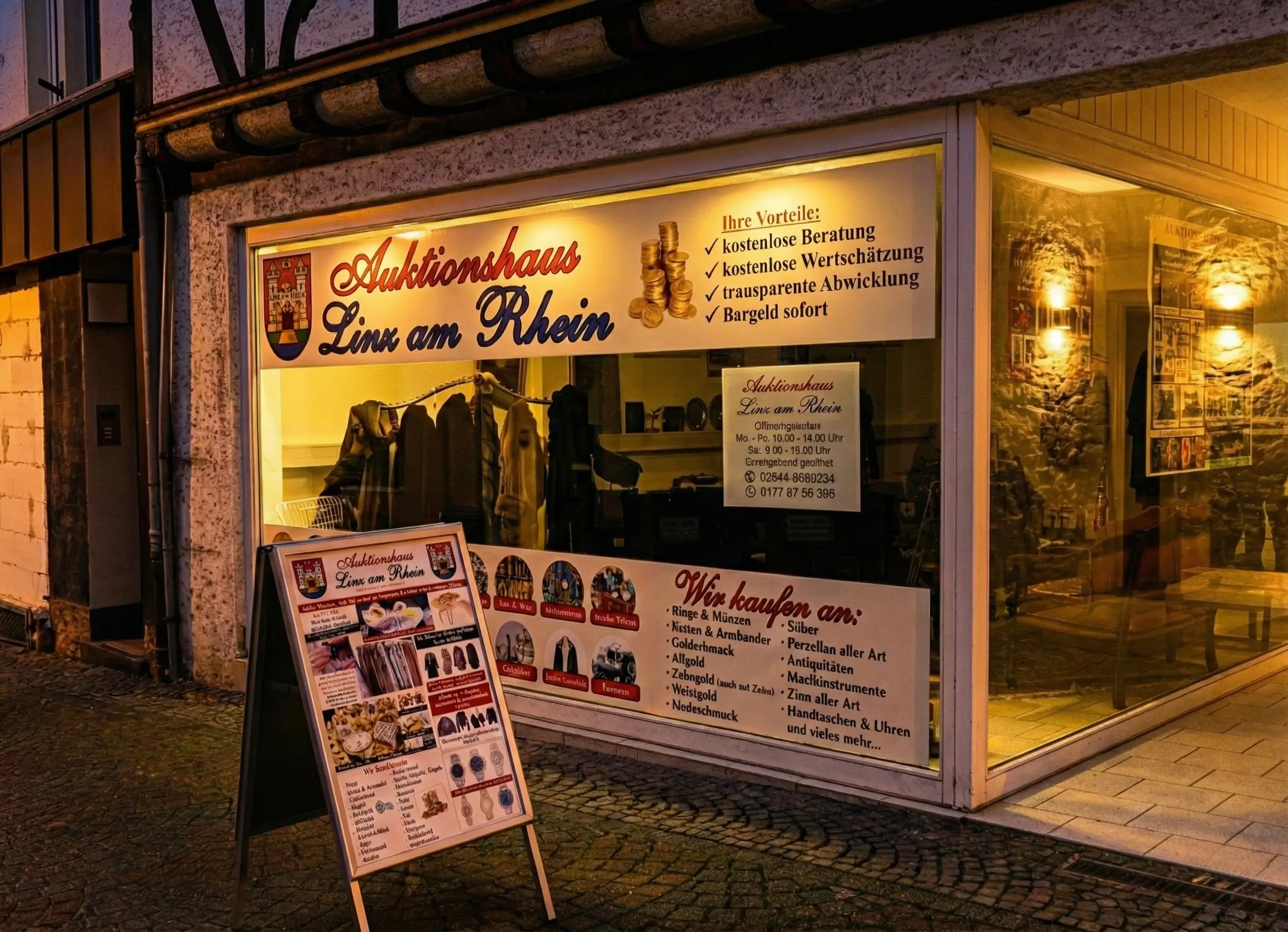 Auktionshaus Linz am Rhein – Schaufenster bei Nacht